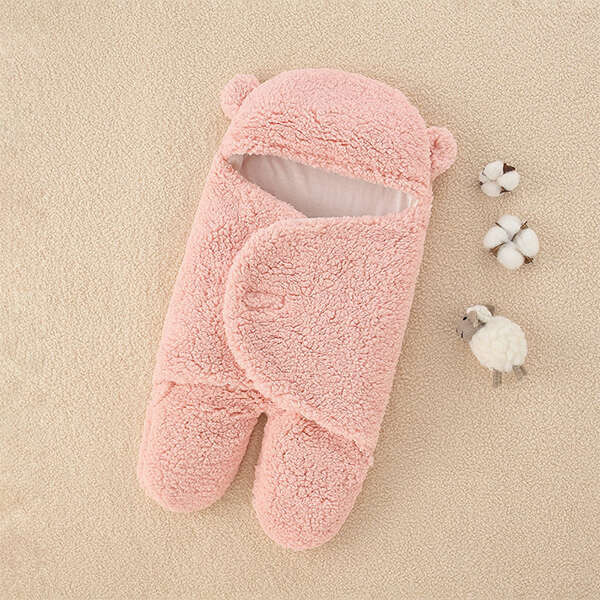 Teddy-O, mekani i udobni prekrivač za bebe u rozoj boji. Idealan poklon za novopečene mame.