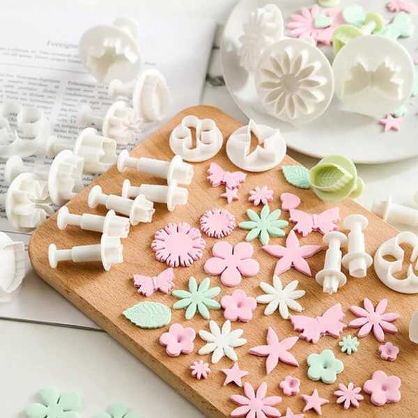 CookieShapes je 47-dijelni set kalupa za kolače, koji omogućava izradu raznih vrsta raznobojnih kolačića.